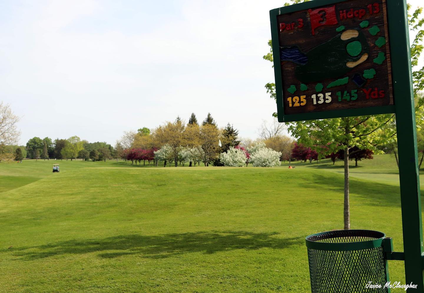 golf course with sign